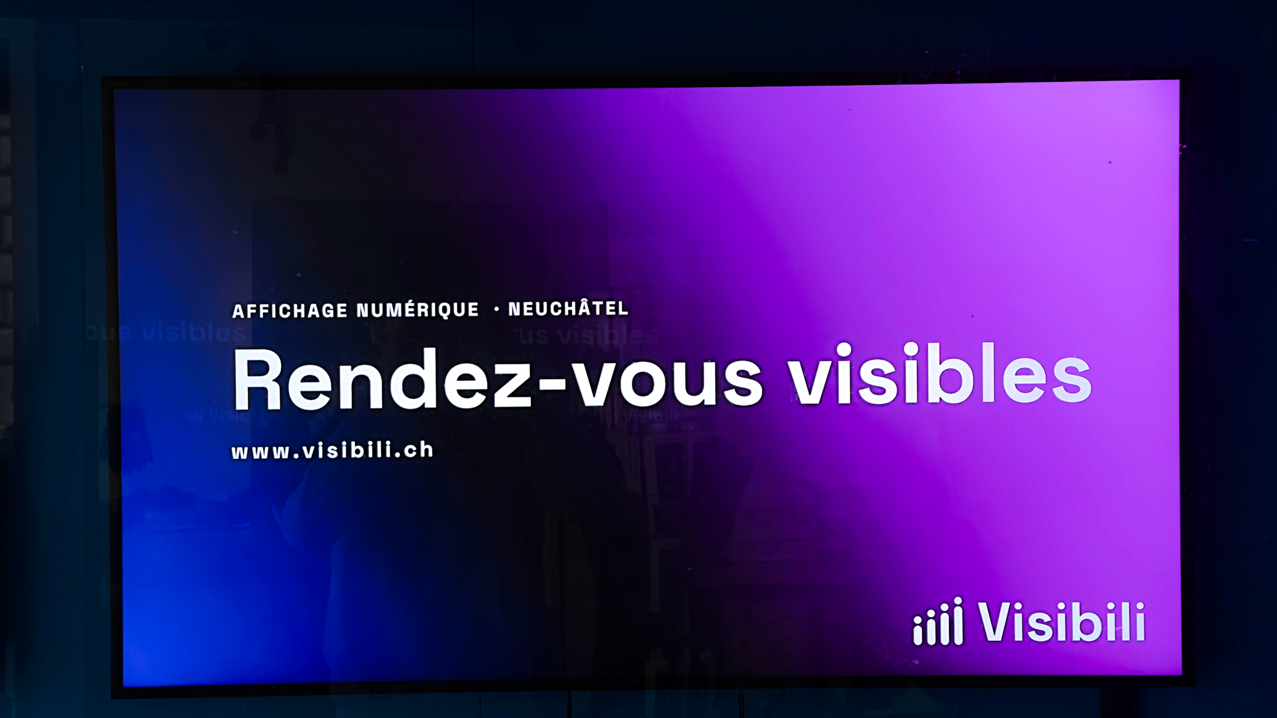un écran affichant la publicité de visibili
